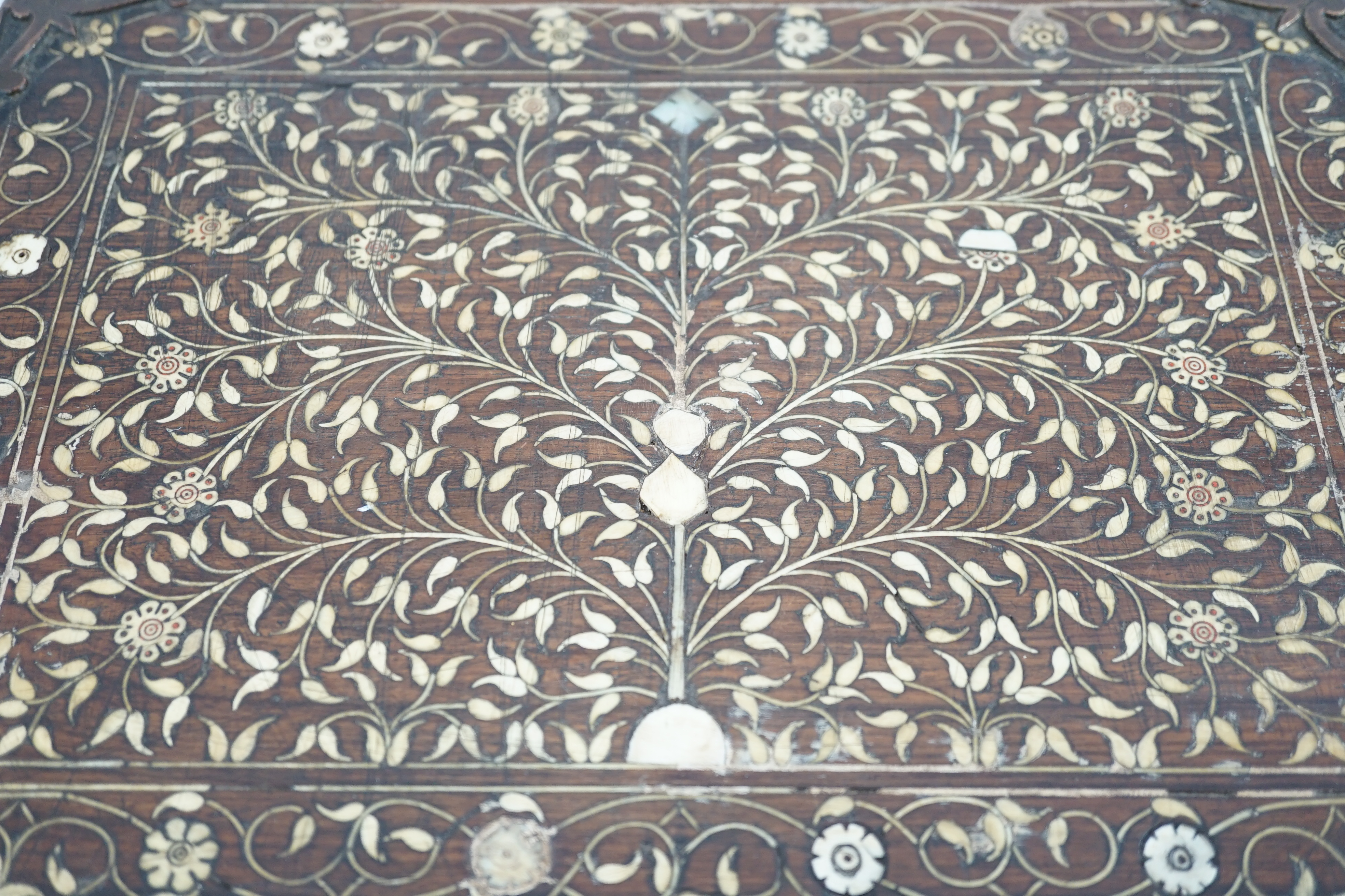 An early 17th century Indo-Portuguese ivory inset hardwood travelling chest